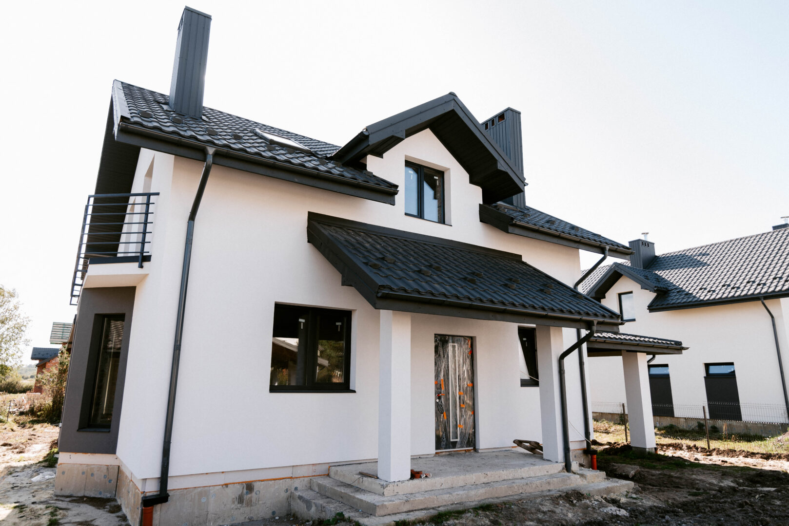 Влаштування теплоізоляції фасаду в котеджному містечку PRAUD HILLS